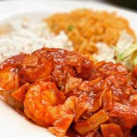 Camarones À La Diabla · Spicy. Shrimp cooked with diced bits of ham and sautéed in our 