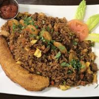 Chaulafan · Ecuadorian style fried rice mix with beef, chicken, shrimp, peas, carrots, and two eggs. Ser...