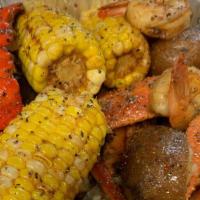 Family Feasts · Beach feast (crab legs, lobster, 1/2lb shrimp, turkey sausage, corn, and red potatoes).