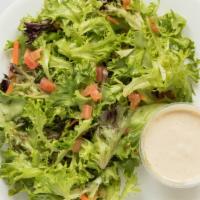 Insalata Mista · Gluten-free. A blend of baby California greens tossed in a white balsamic vinaigrette, toppe...