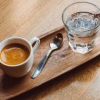 Espresso · Perfectly extracted espresso- Served with a side of mineral water