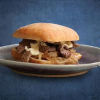 Philly Signature Steak · Philly meat, onions, mushrooms, green peppers, provolone-American cheese.