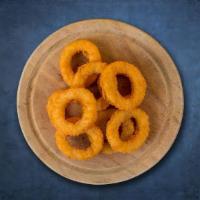 Onion Rings · Sweet onion wrapped in a crunch of perfectly crispy breading