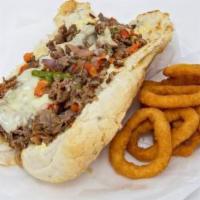 Philly Steak Sandwich · Choice of thinly sliced beef, chicken, or lamb grilled to perfection with bell peppers, onio...