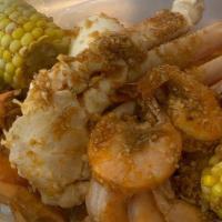 Combo A - Snow Crab & Shrimp (No Head) 1/2 Lb · Come with two corn and two potatoes.