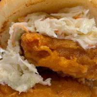 Fish 'Wich · Beer battered Atlantic cod, smothered in tartar sauce and topped with our house slaw. Served...