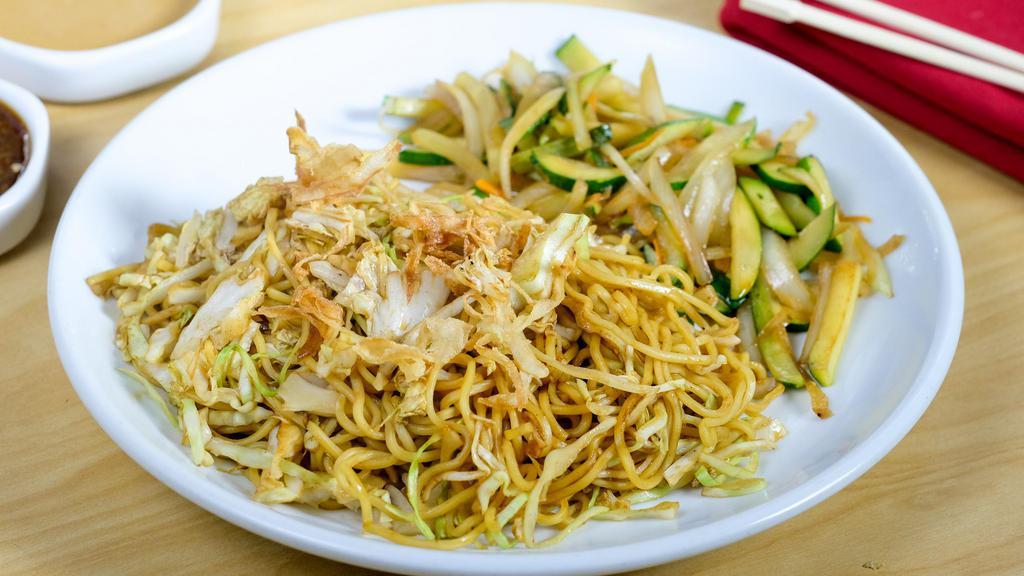 Yakisoba Chicken · Japanese sautéed noodles with vegetables in a special sauce.