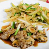 Beef Julienne · Teriyaki beef with green onions and mushrooms grilled in a homemade teriyaki sauce.