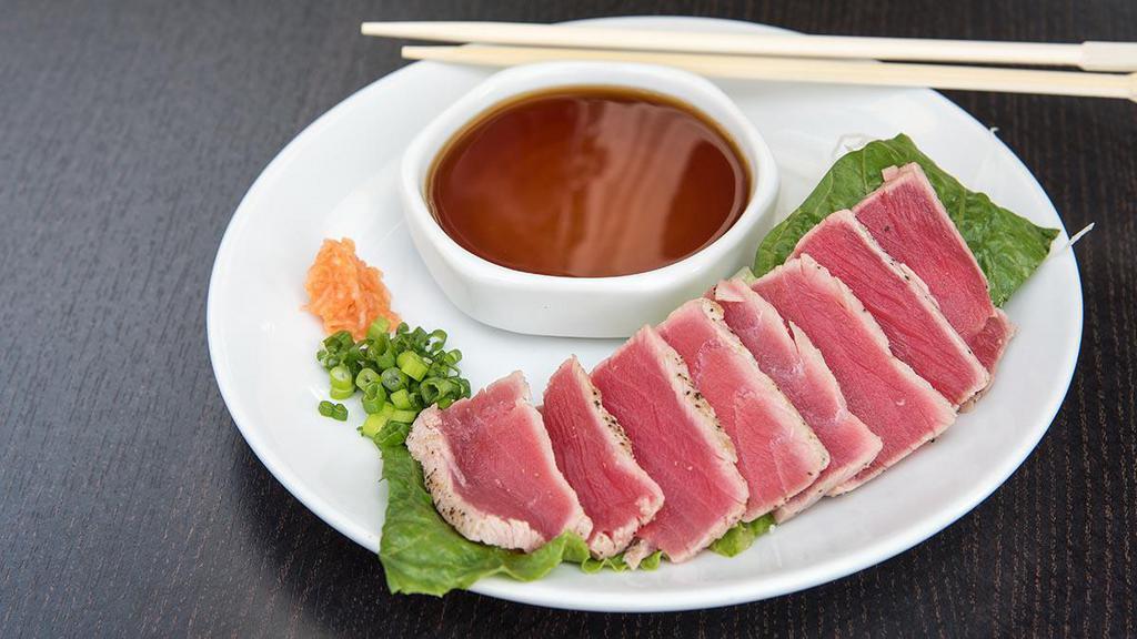 Tuna Tataki · Seared sashimi grate tuna served with ponzu sauce.