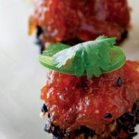 Crispy Spicy Tuna · Crispy sesame rice balls, jalapeño, cilantro, drizzled with soy chili sauce.