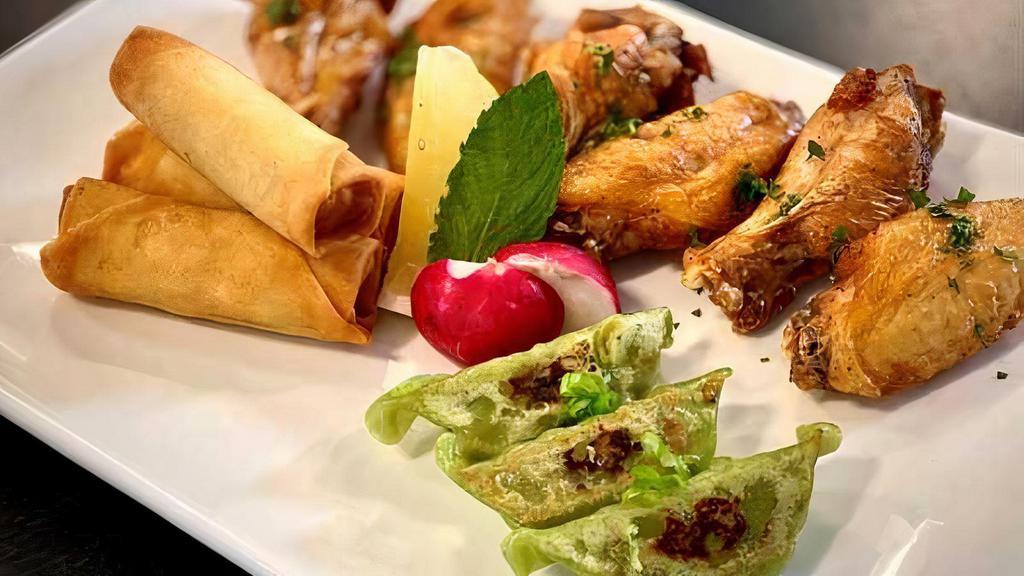 Tokyo Wings Appetizer Sampler · Choice of 1 sauce Black Pepper Teriyaki Sauce or Spicy Sauce or Sesame Garlic Sauce  Your choice of Gyoza  Beef or Edamame & Vegetable  or Spicy Chicken served with Spring Rolls.