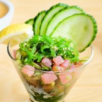 Tuna*Poke (Regular Or Spicy) · Onions, Seaweed Salad, Sweet Soy Sauce, Cucumber and Lemon