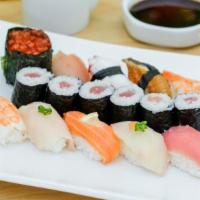 Sushi Deluxe · One tuna roll with an assortment of fresh nigari.

*We are required by the Health Department...