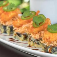 Chili Shrimp Roll · Crab (contains imitation crab), cream cheese, and seaweed tempura in a spicy chili sauce, to...