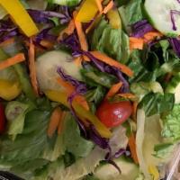 Cuomo Garden Salad · Fresh crisp Garden Greens tossed with Red Onion, sliced red & yellow Bell Pepper, purple Cab...