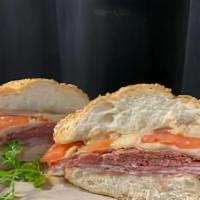 Italian Deli Grinder · An Italian neighborhood favorite! Abundant slices of ham, salami, capicola, mozzarella, and ...