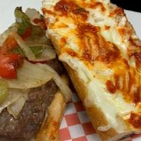 Italian Sausage Grinder · Cuomo fresh sausage recipe formed into a long patty, baked with sweet and/or hot peppers, on...