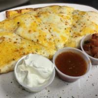 Chicken Quesadilla · Oven baked roasted chicken, three cheese blend. Served with salsa, sour cream and pico de ga...