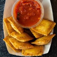 4 Cheese Toasted Ravioli · cooked to perfection with mozzarella, ricotta, romano, and parmesan cheese