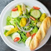 Garden Salad · Hearts of romaine, tomato, sweet red onion, cucumber, boiled egg and pepperoncini peppers.