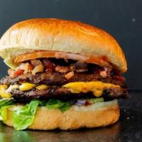 Bacon Double Steakburger · (2) 6 oz juicy steak burgers with american cheese and bacon topped with lettuce, tomato, ket...