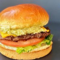 A Steakburger · 6 oz juicy steak burger with home made avocado spread, lettuce, tomato, and american cheese