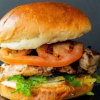 Factory Chicken Sandwich · Juicy  6 oz grilled chicken breast with lettuce, tomato, onions, and a house made creole sau...