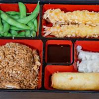 Shrimp Tempura · with vegetable spring roll , gyoza, edamame and chicken fried rice.