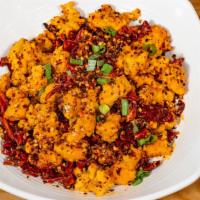 Dried Hot Chili Pepper Chicken · Spicy. Diced chicken fried crispy with garlic, Sichuan peppercorn, blackened chili, and hous...