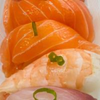 Nigiri Set · Two pieces of tuna, two pieces of salmon, tilapia, scallop, shrimp.