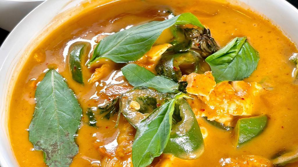 Panang Curry · A classic Thai dish with a choice of meat in a nutty and mellow peanut coconut curry sauce, bell pepper, carrot, and jalapeno, topped with basil. Served with steamed rice.
