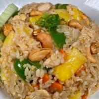 Pineapple Fried Rice  · A Thai-style stir-fry fried rice made with a choice of meat, fresh pineapple, cashew nut, eg...
