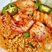 Kimchi Fried Rice  · A Korean-style stir-fry fried rice made with a choice of meat, homemade kimchi, gojuchang (k...