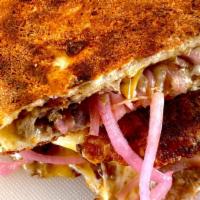 Beef Chorizo Quesadilla · Spicy. A blend of Oaxaca, Provolone & Mozzarella & Sharp Cheddar cheese mixed with our house...