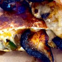Portobello Mushroom  Quesadilla · A blend of Oaxaca, Provolone & Mozzarella & feta cheese mixed with chipotle marinade portobe...