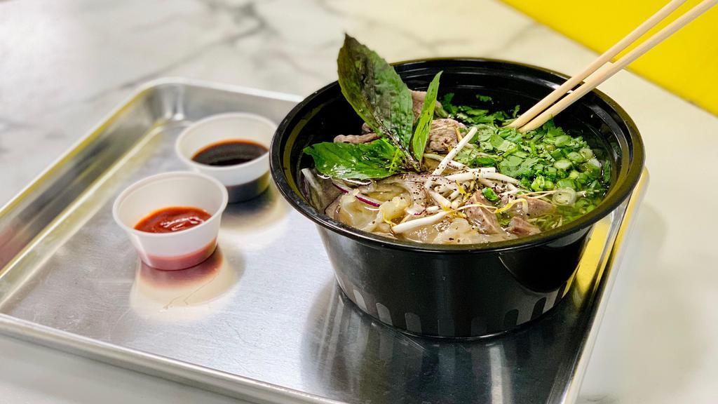 Pho Noodle · Dairy-free. Gluten-free. Vegan optional*  Rice noodles, green and red onion, cilantro, side of vegetable toppings (bean sprouts, basil and fresh lime). With sriracha and hoisin sauce on the side. *Please specify for protein substitutions.*