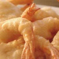1/2 Lb Jumbo Shrimp · Dipped and golden fried , served with Seafood sauce and Hot sauce