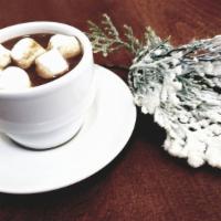 Hot Chocolate · Rich chocolate and steamed milk, optional whipped cream on top.