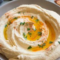Hummus With Bread · Freshly made in-house hummus served with toasted pita bread