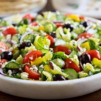 Greek · Fresh lettuce, feta cheese, olives, tomatoes, cucumber, pepper, dressing, bread.