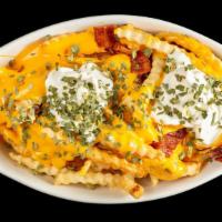 Loaded Fries · Cheese, bacon, sour cream, and chives.