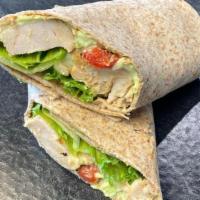 Roasted Turkey Wrap · Roasted turkey wrap with avocado cream cheese, roasted red peppers, and sweet lettuce.
