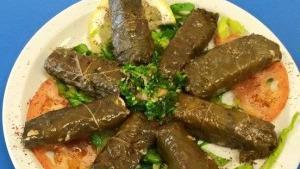 Grape Leaves · Grape leaves stuffed with rice, tomatoes, parsley and onions.