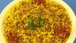 Mujaddara · Cooked lentils and rice mixed with glazed onions.