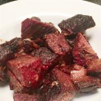 Burnt Ends · Tender smoked brisket, cut in cubes, re-seasoned, and put back in the smoker creating a robu...
