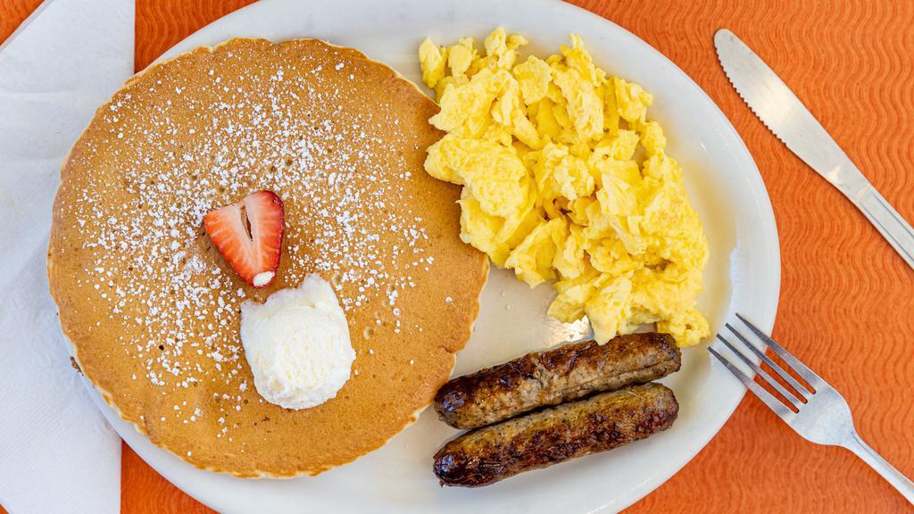 Pancake Breakfast · Two pancakes served with choice of meat and two eggs.