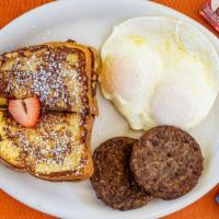 French Toast Breakfast · Two thick slices of sweet egg bread, custard dipped and grilled golden with choice of meat a...