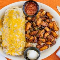 Smothered Burrito · Herb garlic tortilla filled with cheddar jack cheese, beans, onions, peppers and scrambled e...