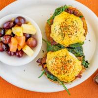 Florentine Benedict · We start with a toasted wolferman English muffin, then add fresh spinach, sliced tomato, cri...