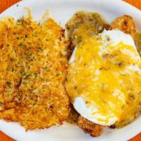 Chili Relleno Breakfast · Monterey jack stuffed relleno topped with two eggs and melted cheddar jack cheese. Served on...